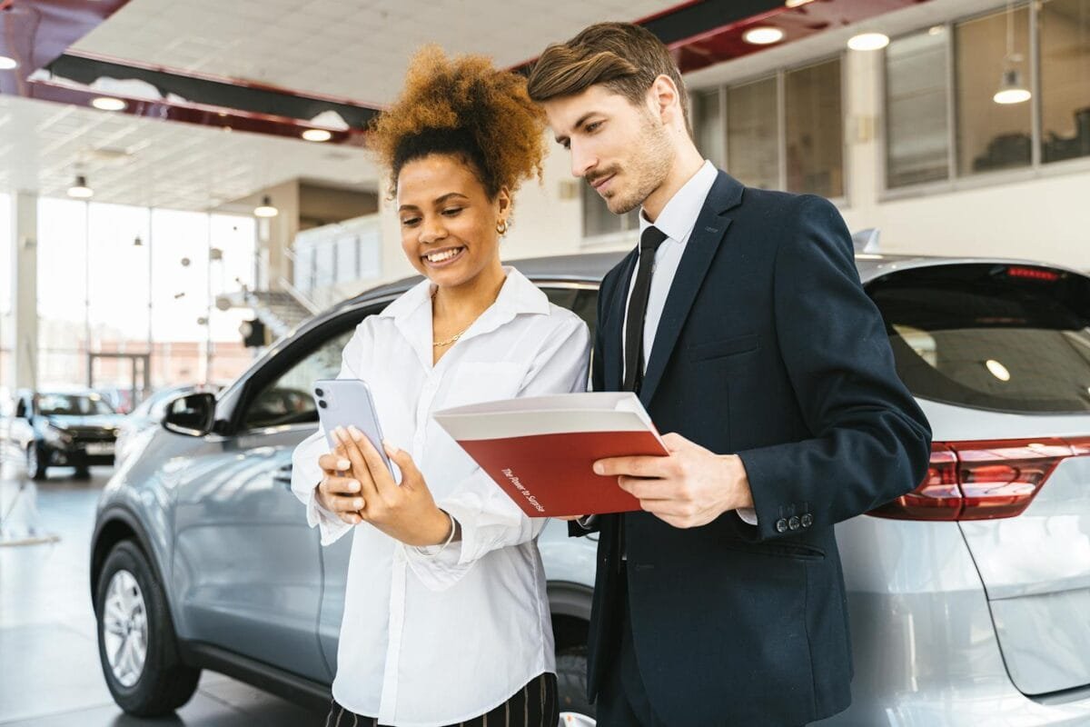 A Woman at a Car Dealership